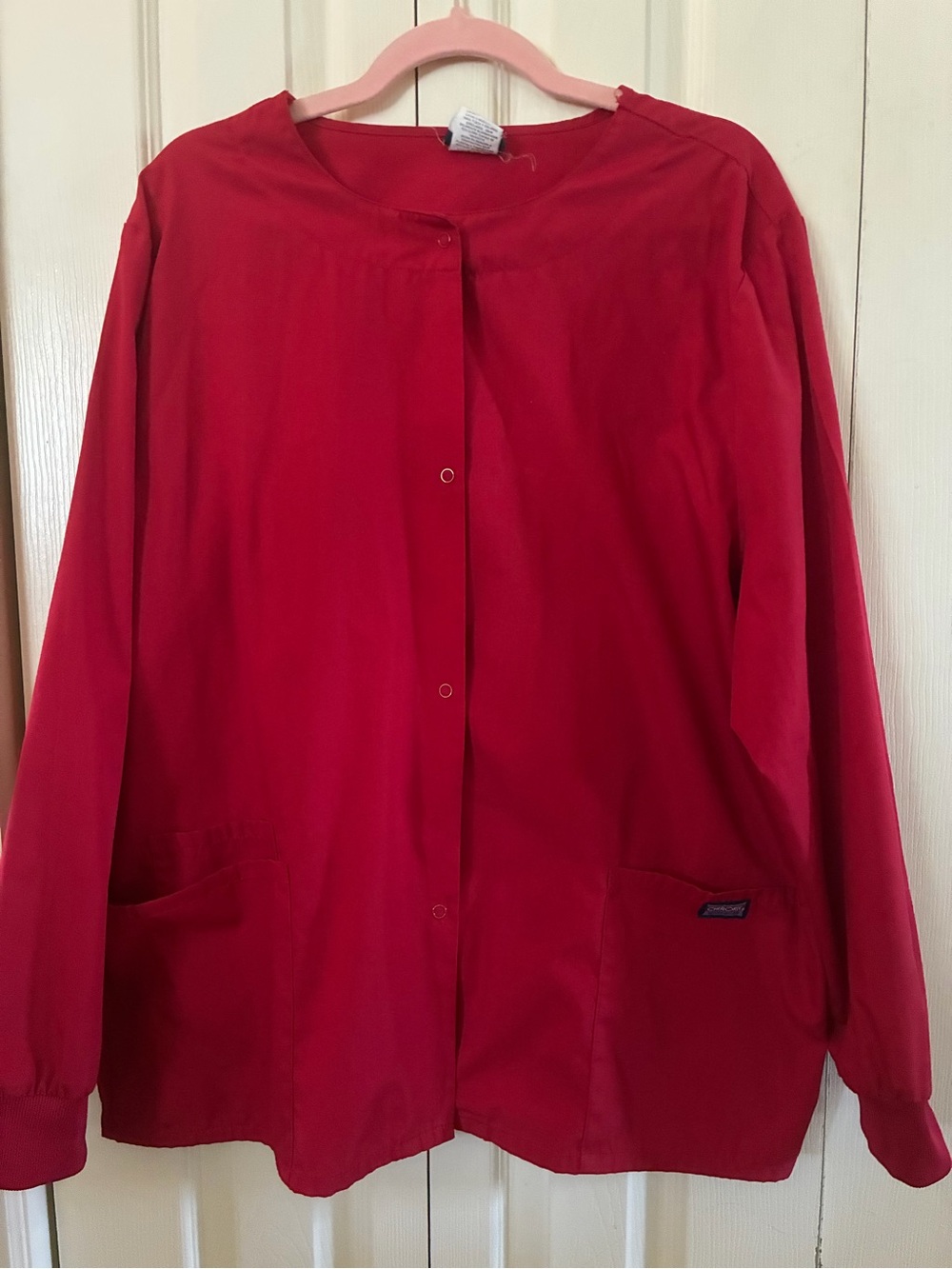 Red Women's Cherokee Snap-Front scrub top. Long sleeve
